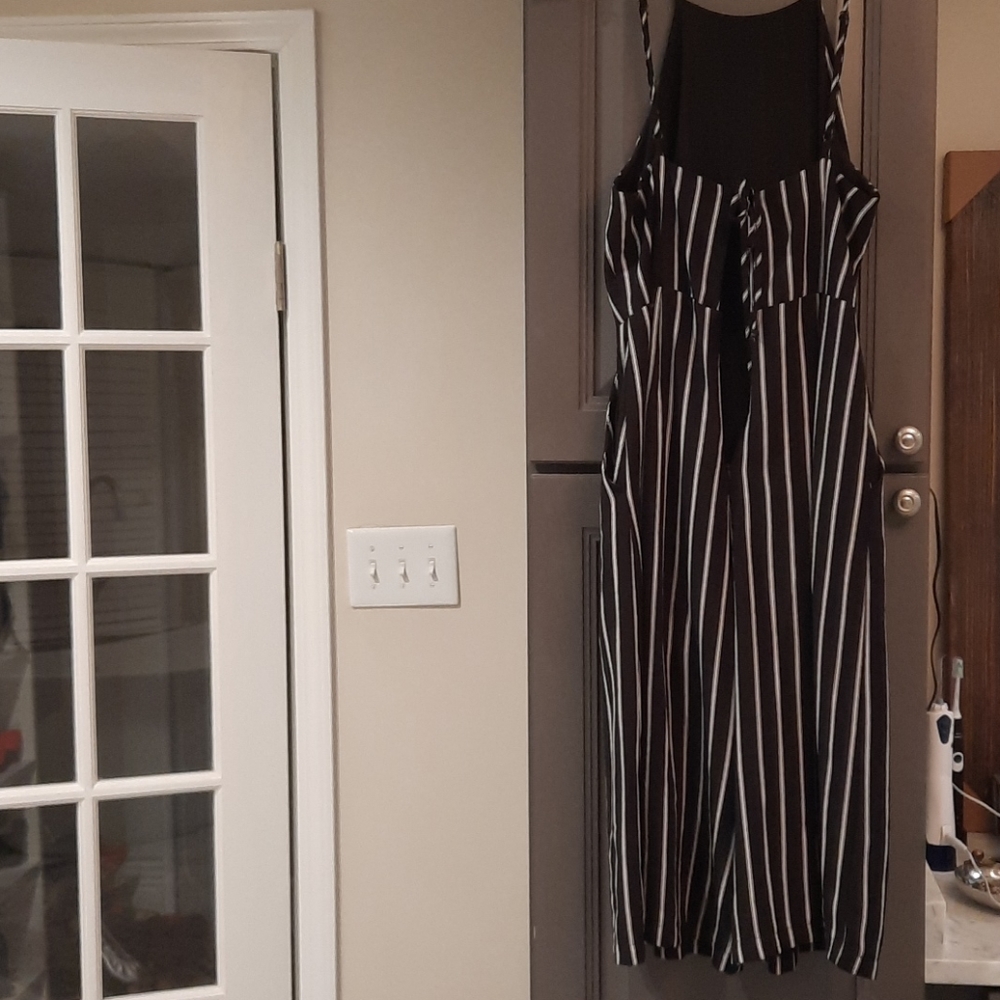 Astr jumper. Black with white stripes.  Size L